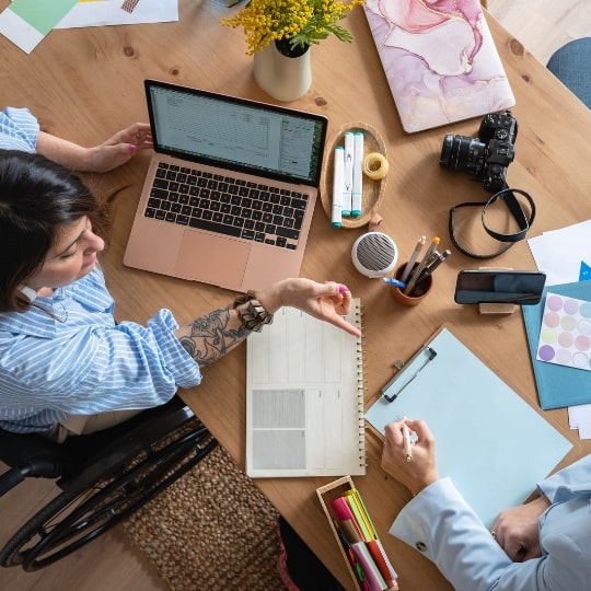 A marketing team working on logo and branding.