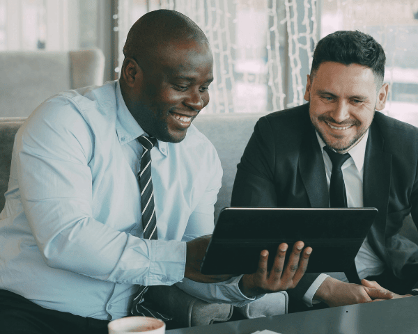 Two business owners happy with their digital advertising agencies.