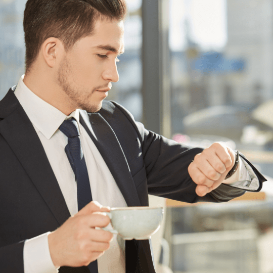 A person looking at a watch.