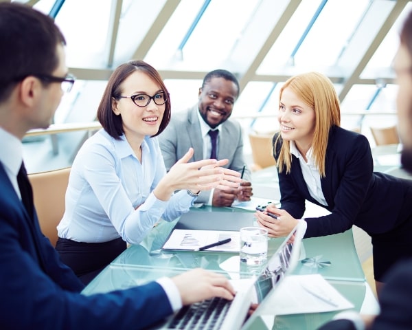 A digital marketing company in us group talking to each other.