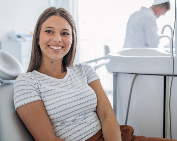 A happy dental patient smiling.