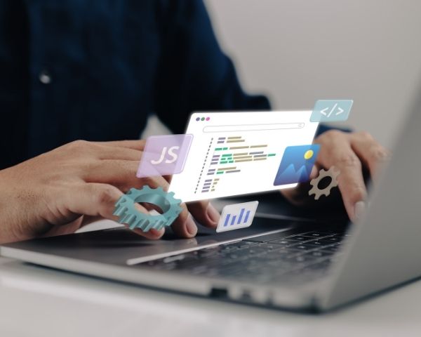 An man clicking on his laptop.