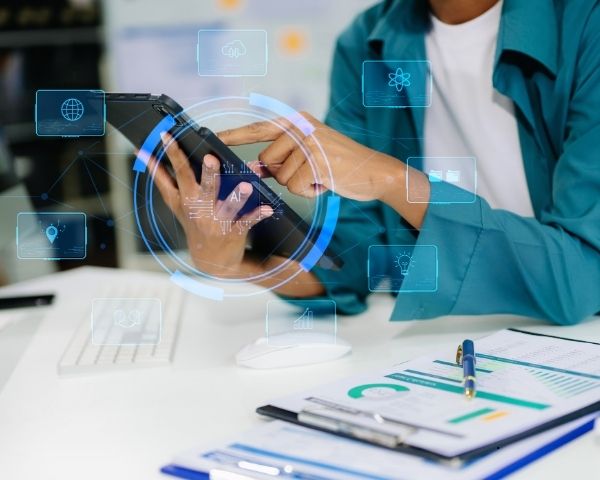 A person that has a digital marketing company holding a tablet