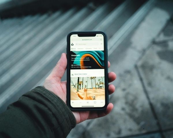 A person holding their phone.