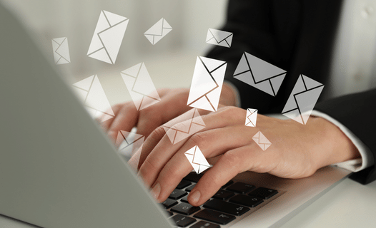 A person working on email marketing firms working hard.