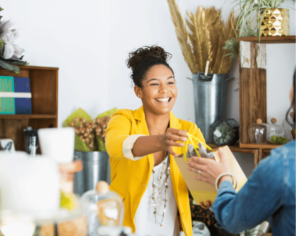 A business owner selling products due to social ecommerce.