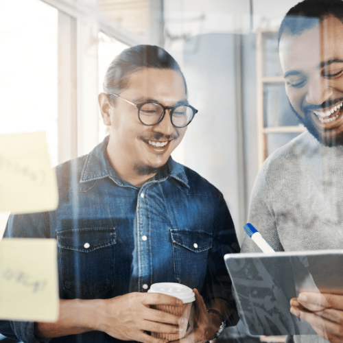 Two people happy with their digital marketing and advertising agency.